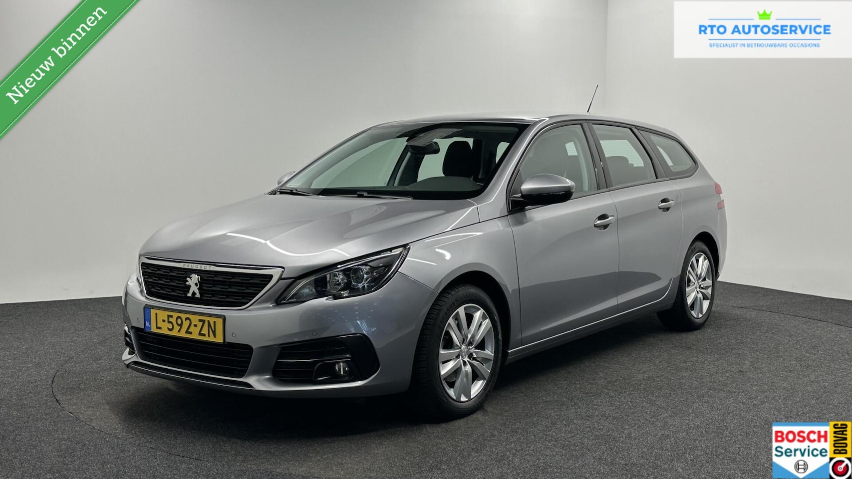 Peugeot 308 SW - 1.2 PureTech Blue Lease Active CARPLAY LM NAVI CRUISE ECC. - AutoWereld.nl