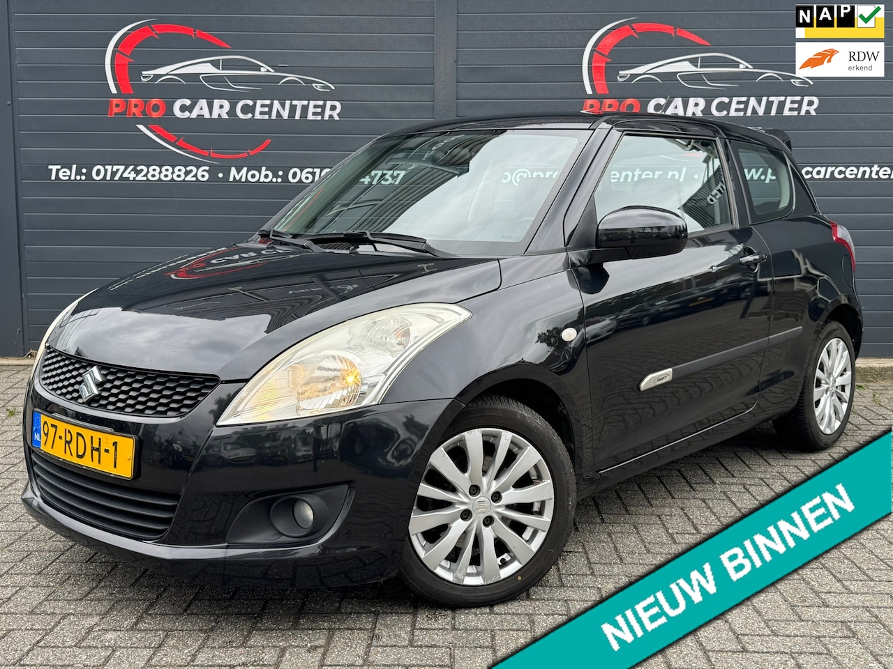 Suzuki Swift - 1.2 Exclusive AIRCO|CRUISE|EL.RAMEN|LMV| - AutoWereld.nl