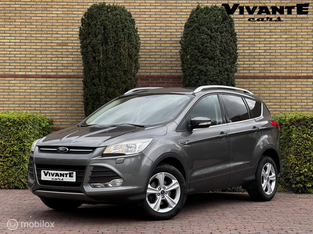 Ford Kuga - 1.6 Titanium Cruise*Clima*Vooruit/Stoel. Vrw*Trekhaak - AutoWereld.nl