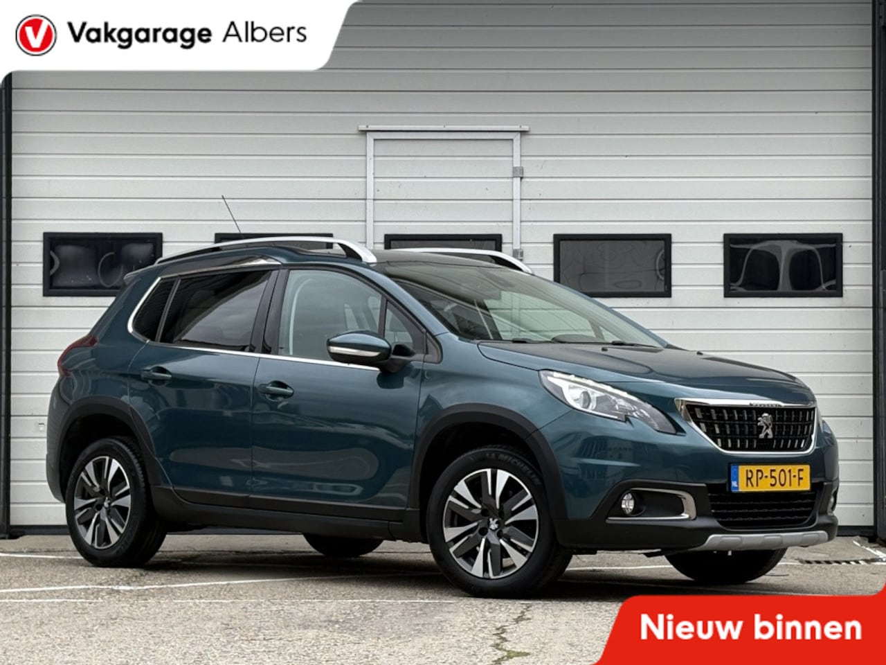 Peugeot 2008 - 1.2 PureTech Allure Navi | Climate | Camera | Apple Carplay|Android - AutoWereld.nl