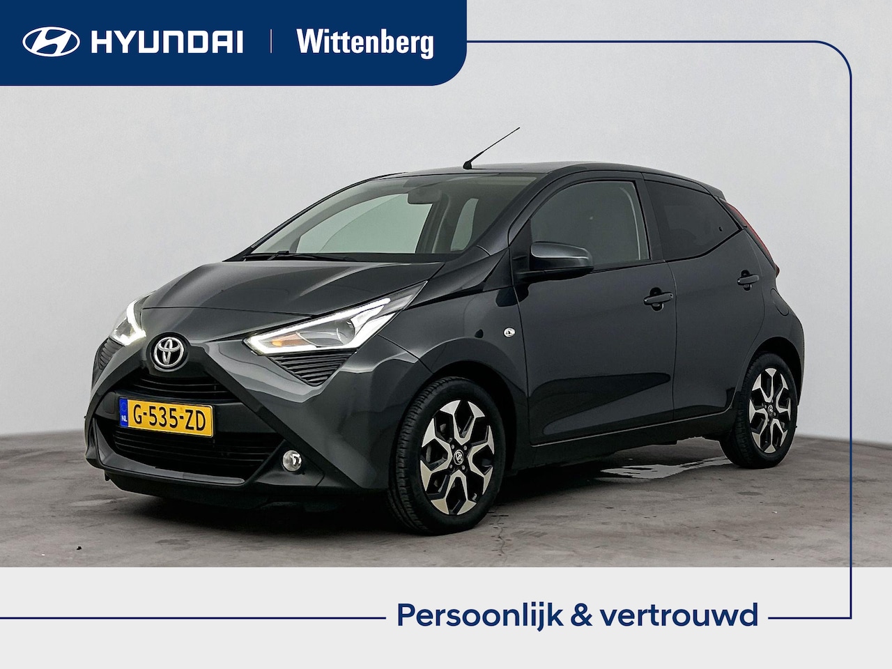 Toyota Aygo - 1.0 VVT-i x-joy | Airco | getint glas | LM velgen | Elektrische ramen | Climate control | - AutoWereld.nl