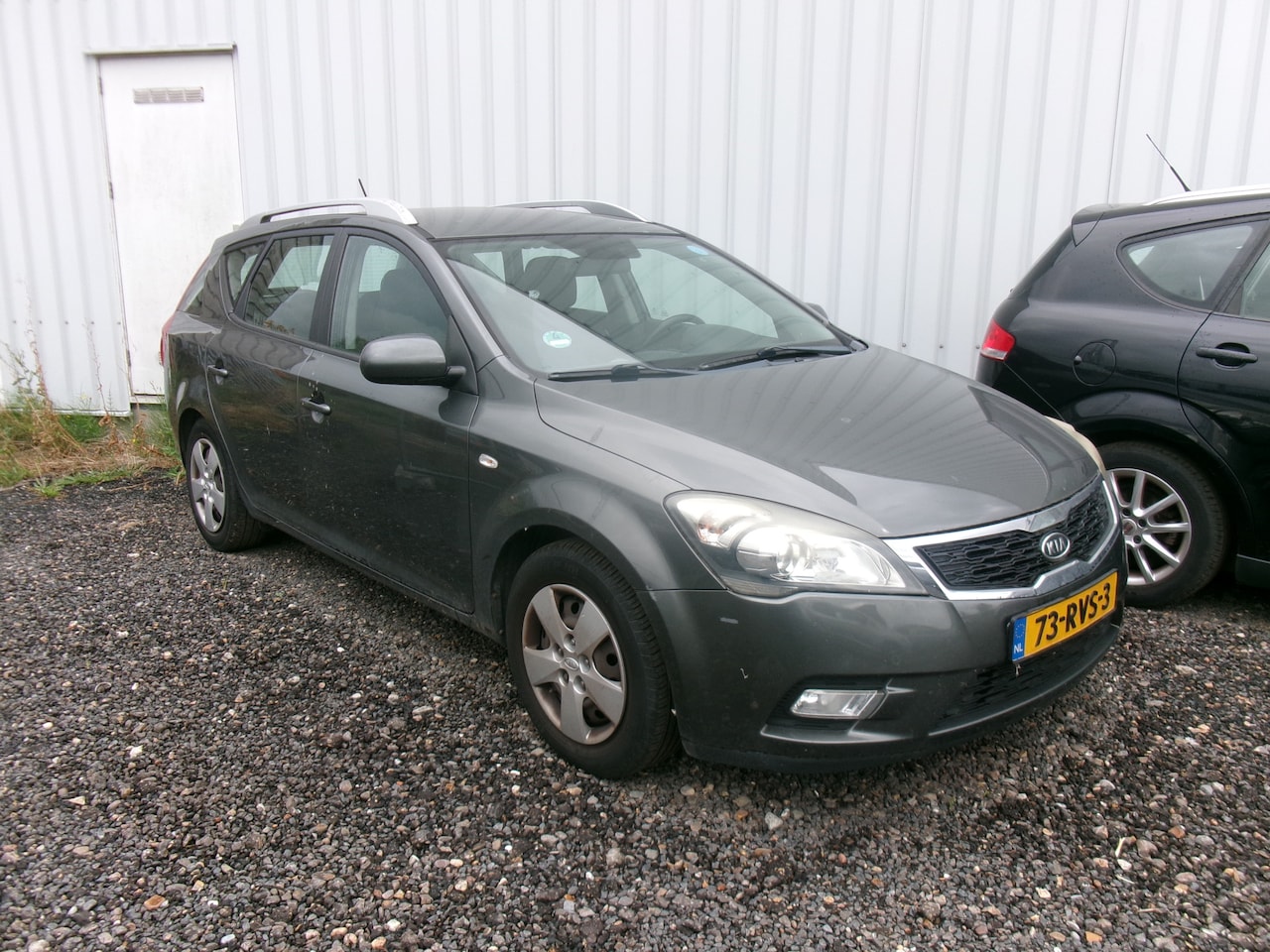 Kia Cee'd Sporty Wagon - 1.4 CVVT Comfort Pack 1.4 CVVT Comfort Pack - AutoWereld.nl