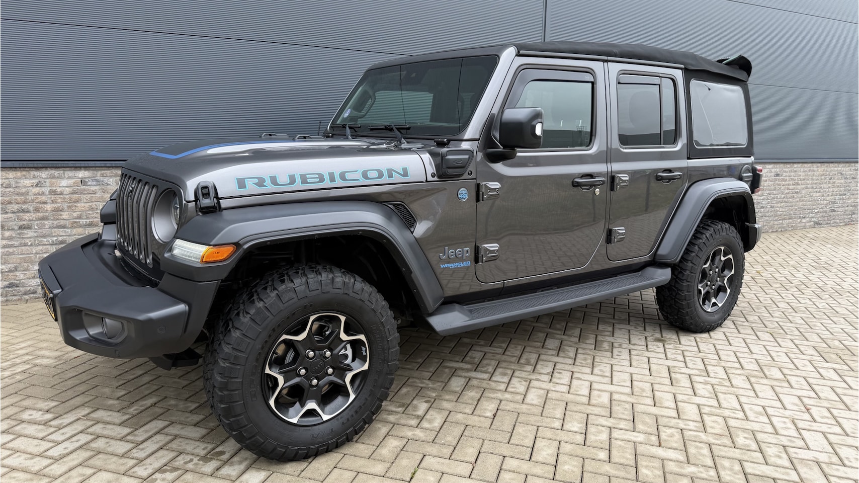 Jeep Wrangler Unlimited - 4xe 380 Rubicon Hybride Cabriolet / zeer compleet en als nieuw ! - AutoWereld.nl