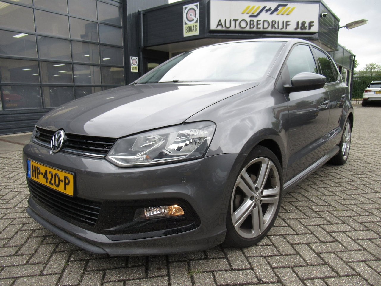 Volkswagen Polo - 1.2 TSI Edition R-line / NAV / PDC 2x / Cruise Control / Bleutooth - AutoWereld.nl