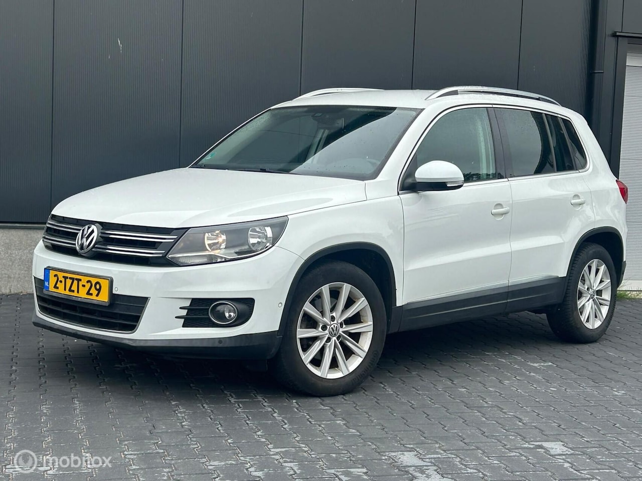Volkswagen Tiguan - 1.4 Sport & Style 160PK NAP Dealer onderhouden - AutoWereld.nl