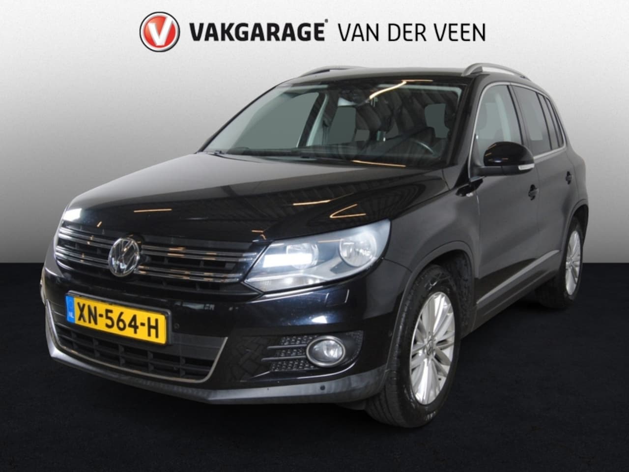 Volkswagen Tiguan - 1.4 TSI Sport&Style | Nav | Cruise | Trekhaak - AutoWereld.nl