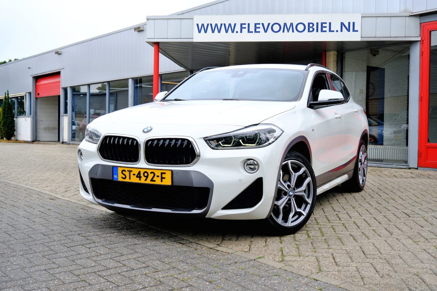 BMW X2 - SDrive18i M Sport Aut. Leder|HUD|Sportstoelen|19" LMV|Navi - AutoWereld.nl