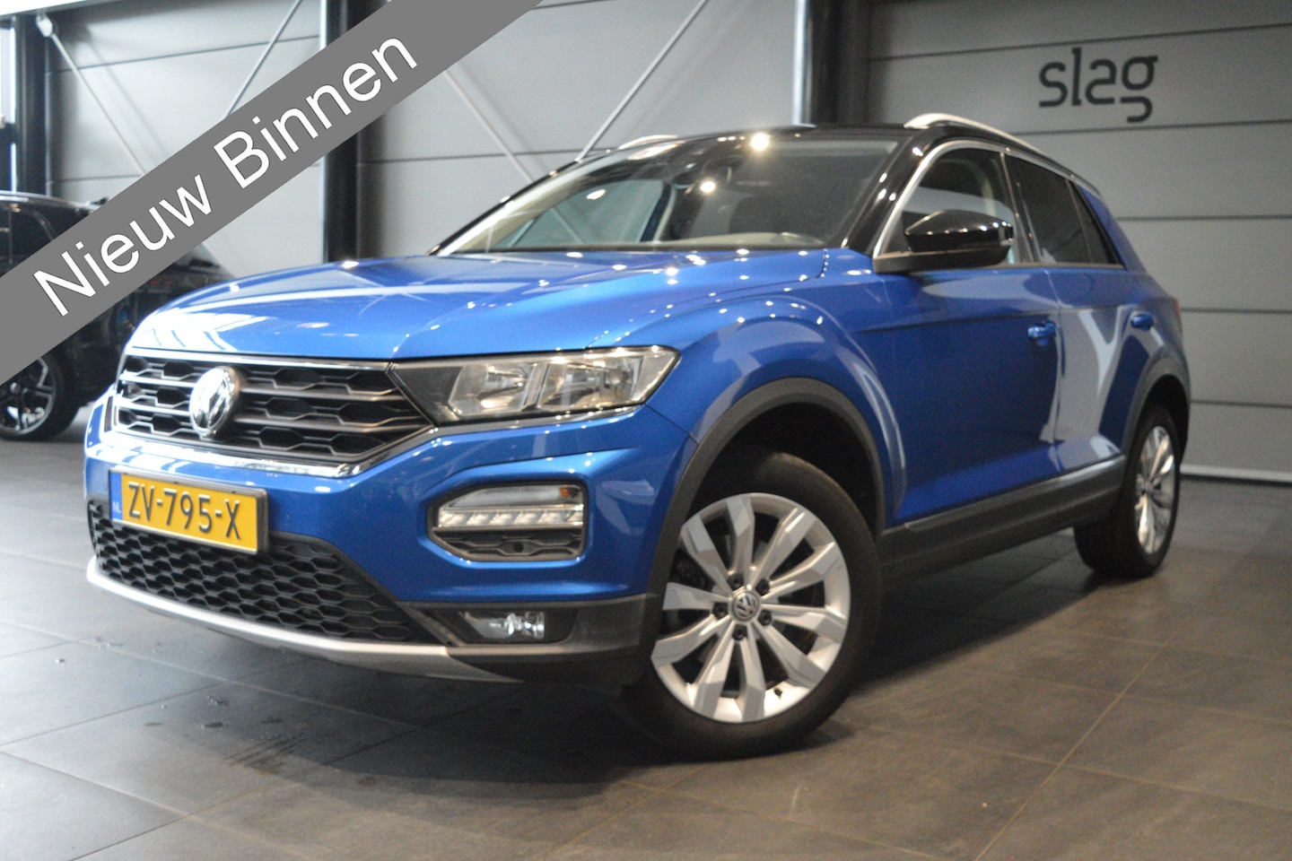 Volkswagen T-Roc - 1.0 TSI Style navi clima cruise pdc trekhaak 17 inch !! - AutoWereld.nl