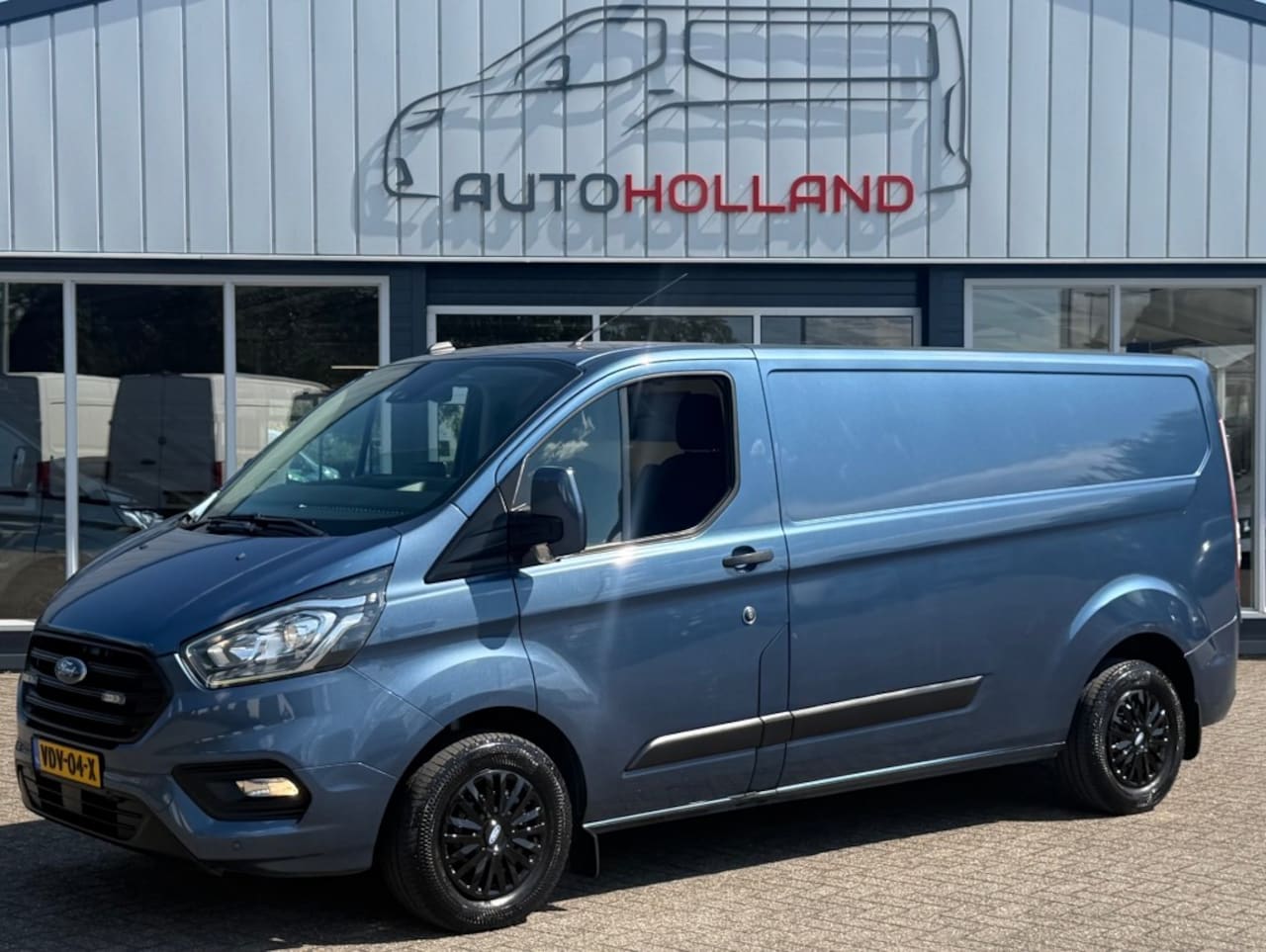 Ford Transit Custom - 2.0 TDCI 96KW 131PK L2H1 EURO 6 AIRCO/ NAVIGATIE/ CRUISE CONTROL/ CAMERA/ 100% DEALERONDER - AutoWereld.nl