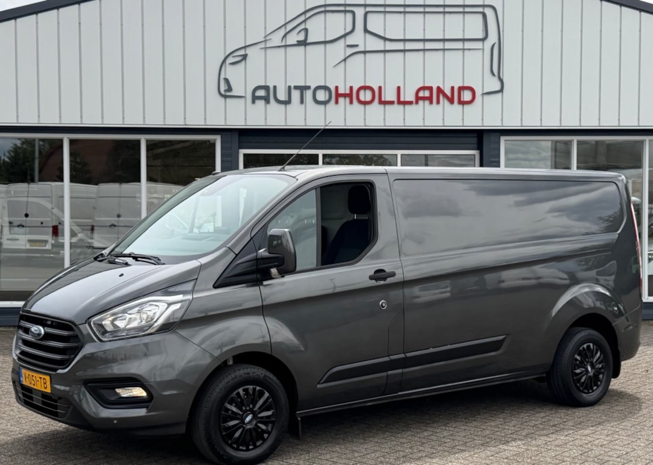 Ford Transit Custom - 2.0 TDCI 77KW 105PK L2H1 EURO 6 AIRCO/ NAVIGATIE/ CRUISE CONTROL/ PARKEERSENSOREN/ 100% DE - AutoWereld.nl