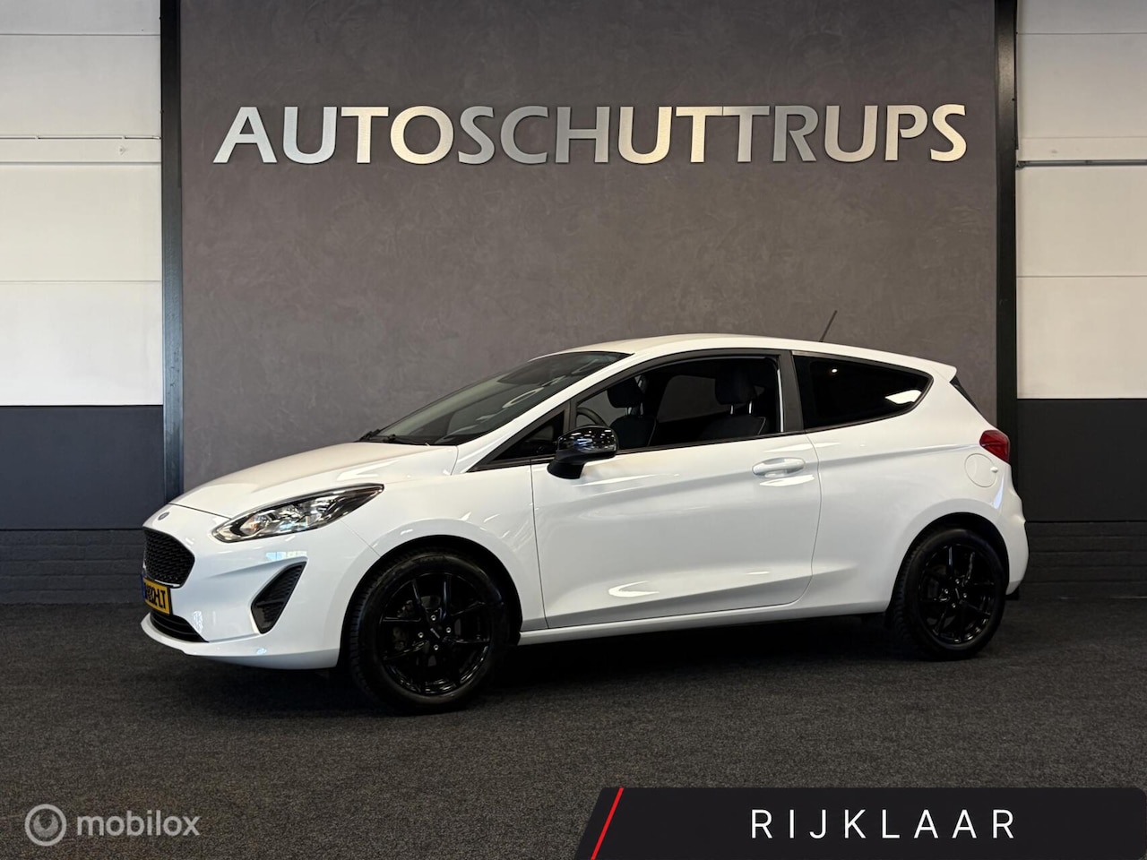 Ford Fiesta - 1.1 AIRCO / CRUISE / MEDIA / ZWART LMV / PDC / LEUKE AUTO - AutoWereld.nl