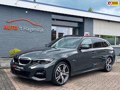BMW 3-serie Touring - 330e xDrive M-sport pano trekh laser 19"