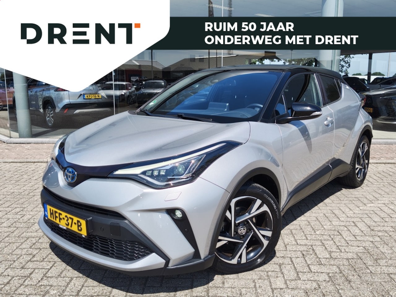 Toyota C-HR - 1.8 Hybrid Style Bi-Tone | Premium Pack | Sensoren v/a | Android - AutoWereld.nl
