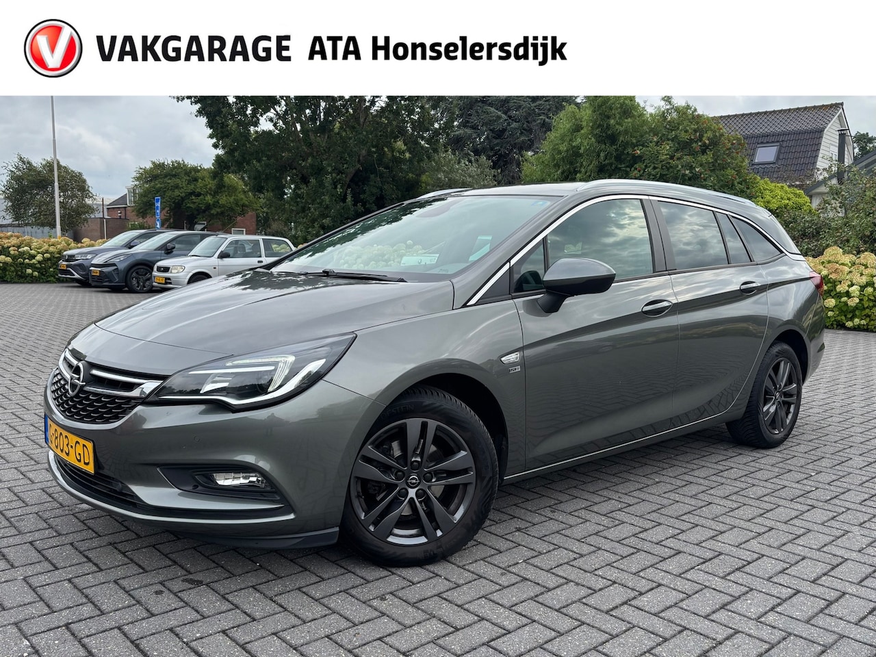 Opel Astra Sports Tourer - 1.0 Turbo 120 Jaar Edition | Cruise control | Climate control | - AutoWereld.nl