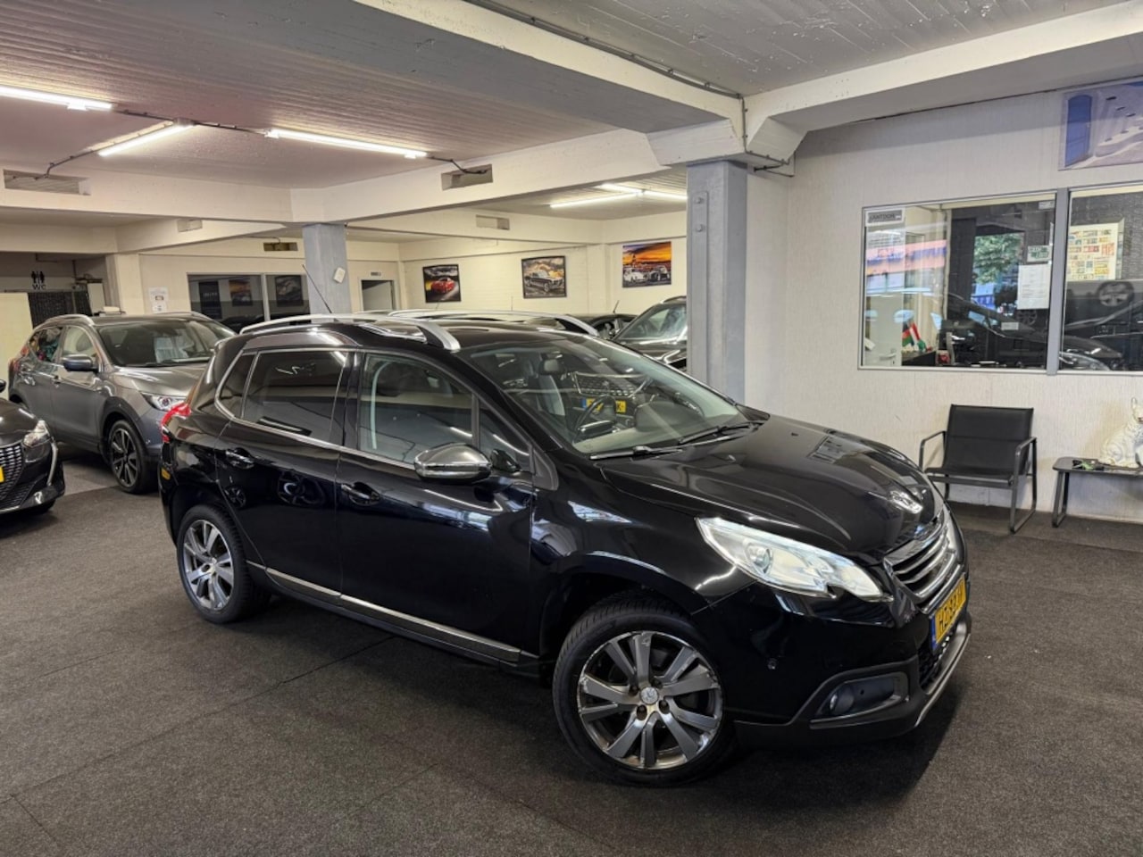 Peugeot 2008 - 1.2 PureTech Allure*Pano*NAP*Nwe d.riem - AutoWereld.nl