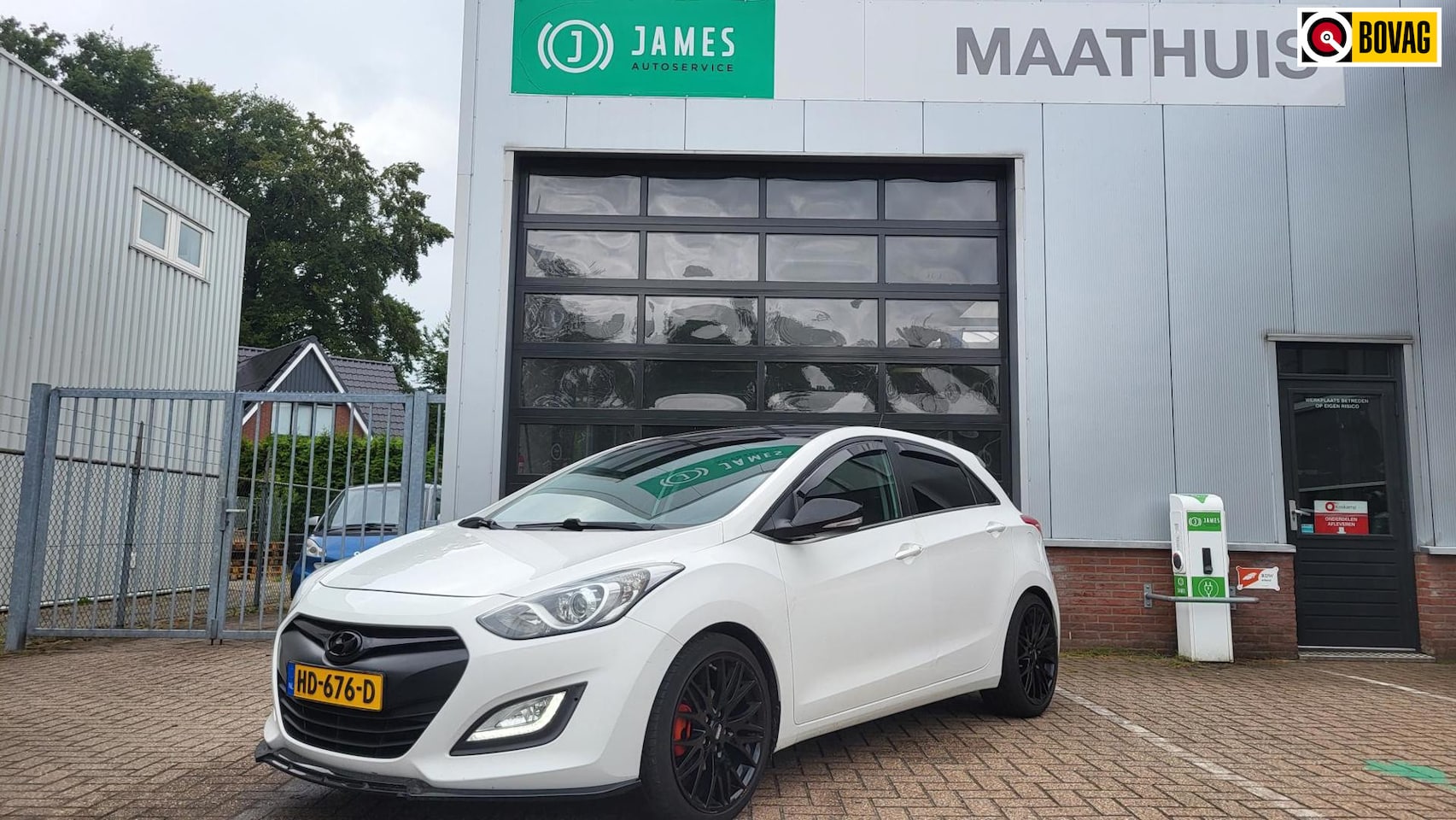 Hyundai i30 - 1.6 GDI i-Motion Plus 5 drs black line - AutoWereld.nl