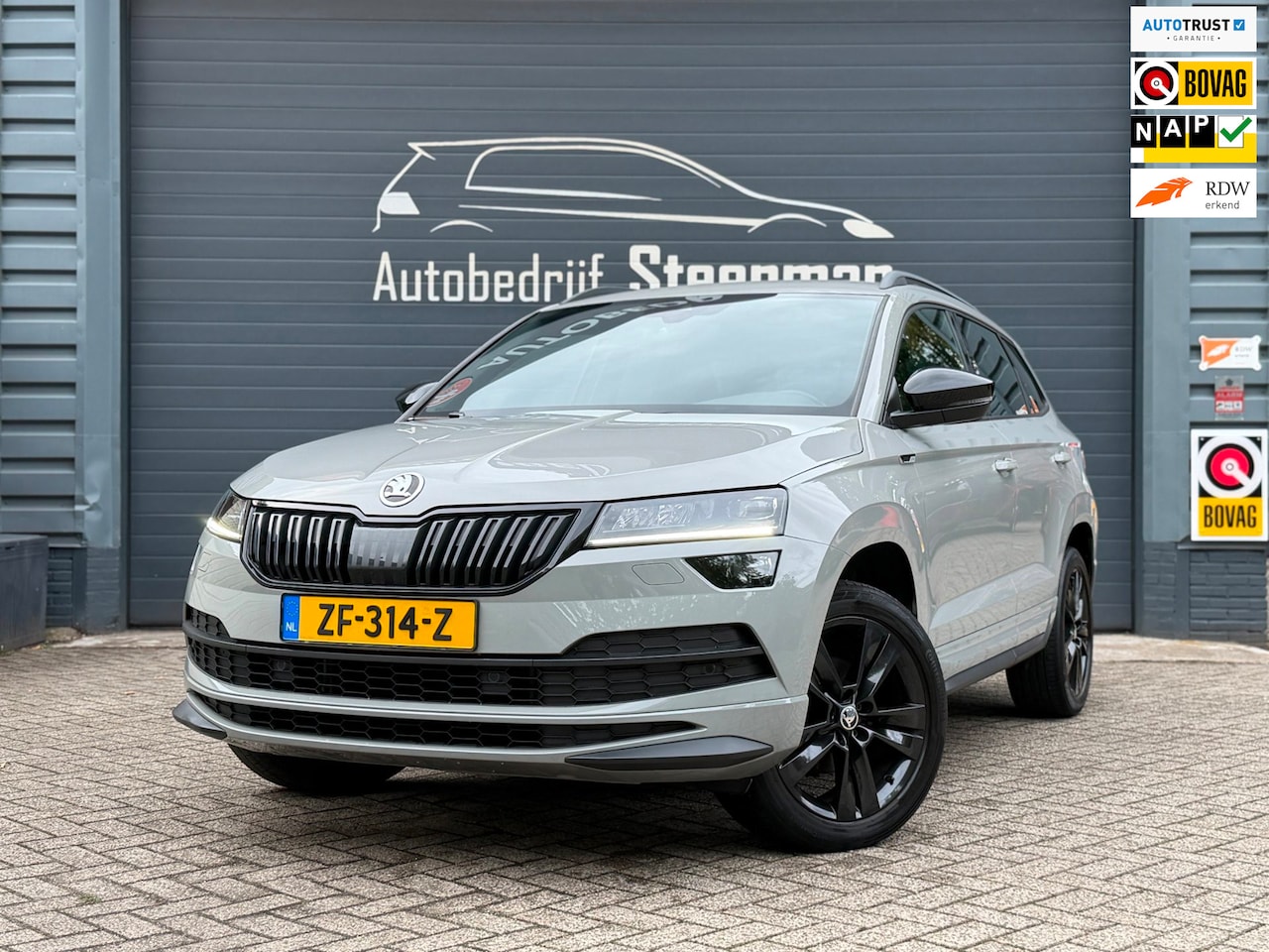 Skoda Karoq - 1.5 TSI ACT Sportline Business | Elektr. trekhaak - AutoWereld.nl
