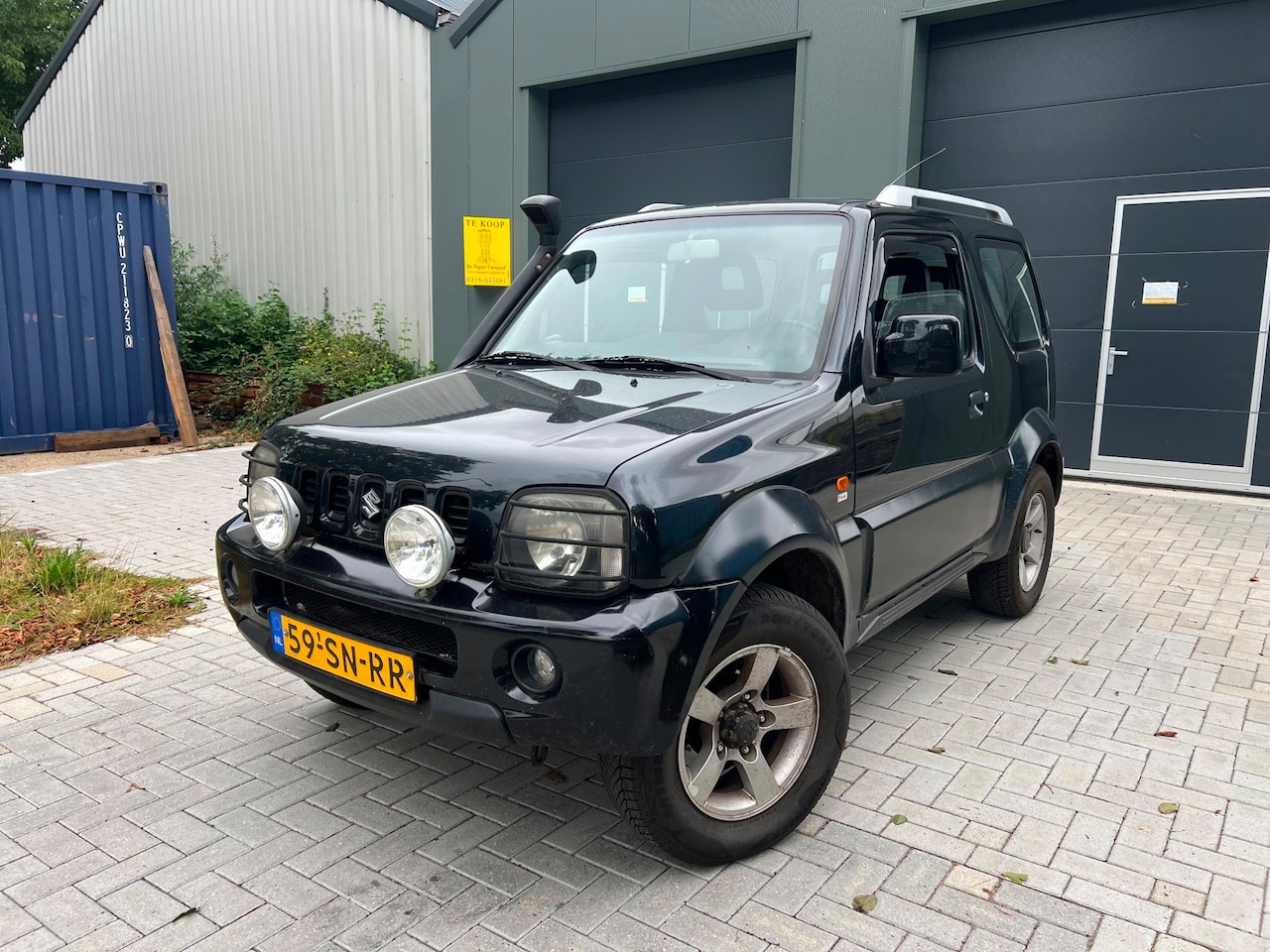 Suzuki Jimny - 1.3 Exclusive 4x4 Airco - AutoWereld.nl