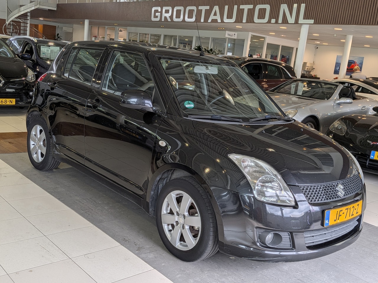 Suzuki Swift - 1.3 Comfort Airco, Stuurbekrachtiging - AutoWereld.nl