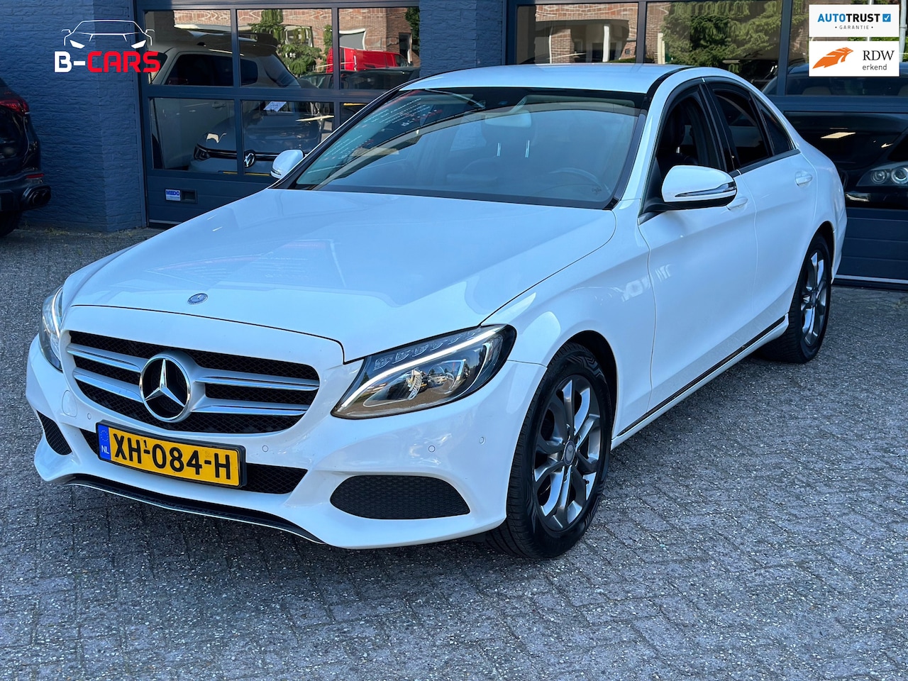 Mercedes-Benz C-klasse - 180 AmbiL|Xenon|Leer|Camera|Pdc|Nap!! - AutoWereld.nl