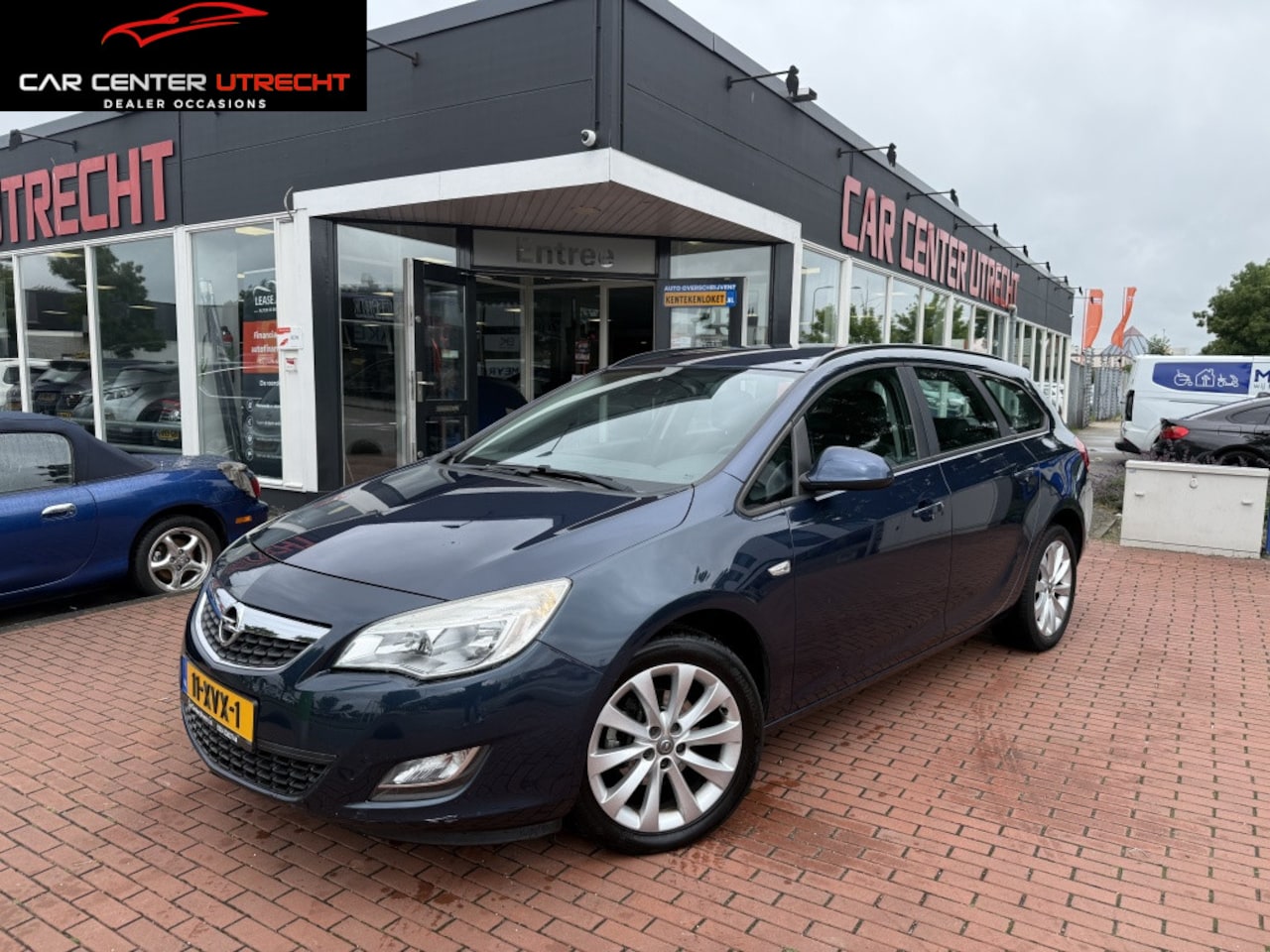 Opel Astra Sports Tourer - 1.4 Turbo Edition | trekhaak | airco | navi | 6vers | - AutoWereld.nl