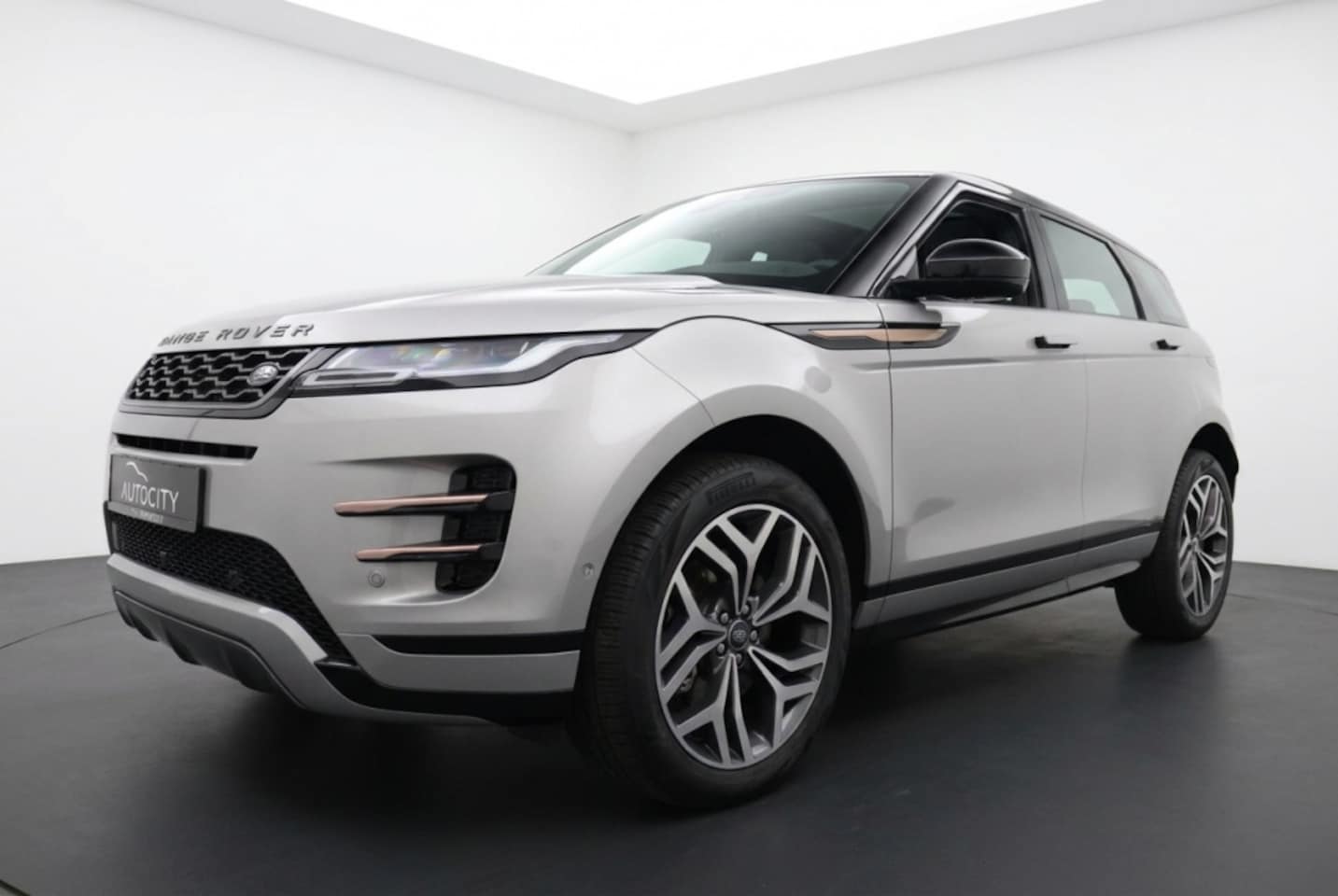 Land Rover Range Rover Evoque - 1.5 P300e AWD R-Dynamic HSE Pano | Leder | Meridian Sound | 20" - AutoWereld.nl
