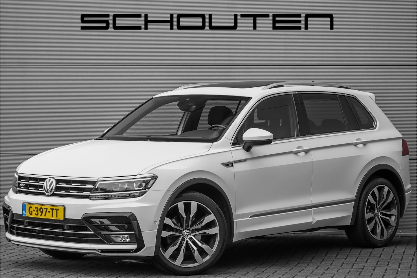 Volkswagen Tiguan - 1.5 TSI DSG R-Line Pano ACC Camera CarPlay 20" Suzuka - AutoWereld.nl