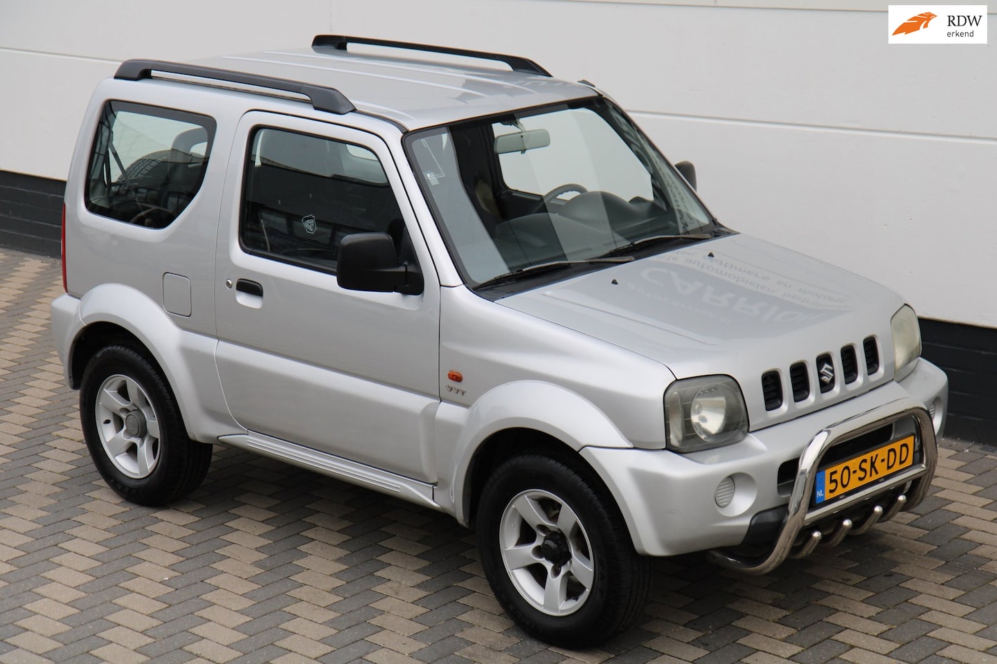 Suzuki Jimny - 1.3 JLX 4WD Airco Trekhaak Carplay NAP !! - AutoWereld.nl