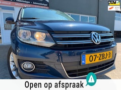 Volkswagen Tiguan - 1.4 TSI Sport&Style van 2de Eig met trekhaak en parkeersensoren en airco en cruise control