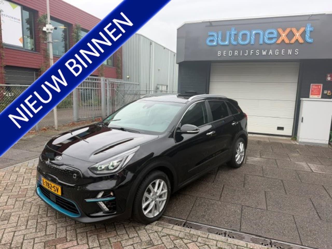 Kia e-Niro - DynamicPlusLine 64 kWh AIRCO I NAV I LEDER INERIEUR I OPEN DAK I 1e EIGENAAR I COMPLETE ON - AutoWereld.nl