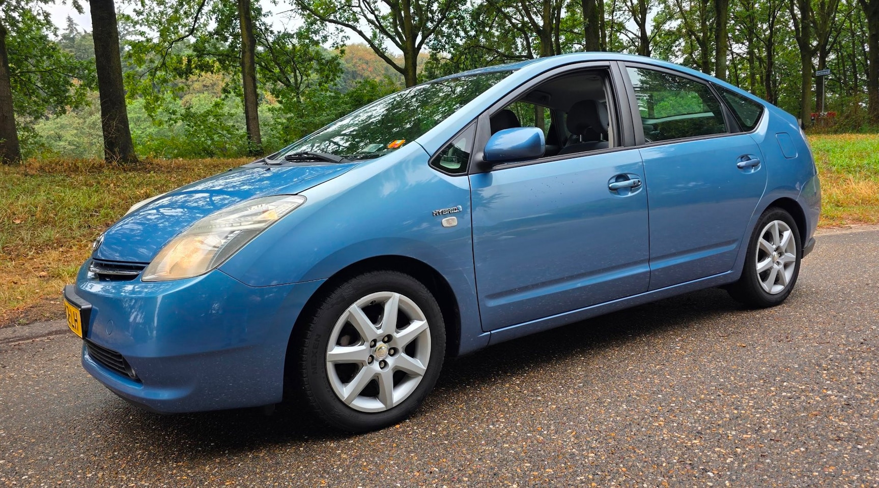 Toyota Prius - 1.5 VVT-i Business Edition Navigatie JBL Airco - AutoWereld.nl