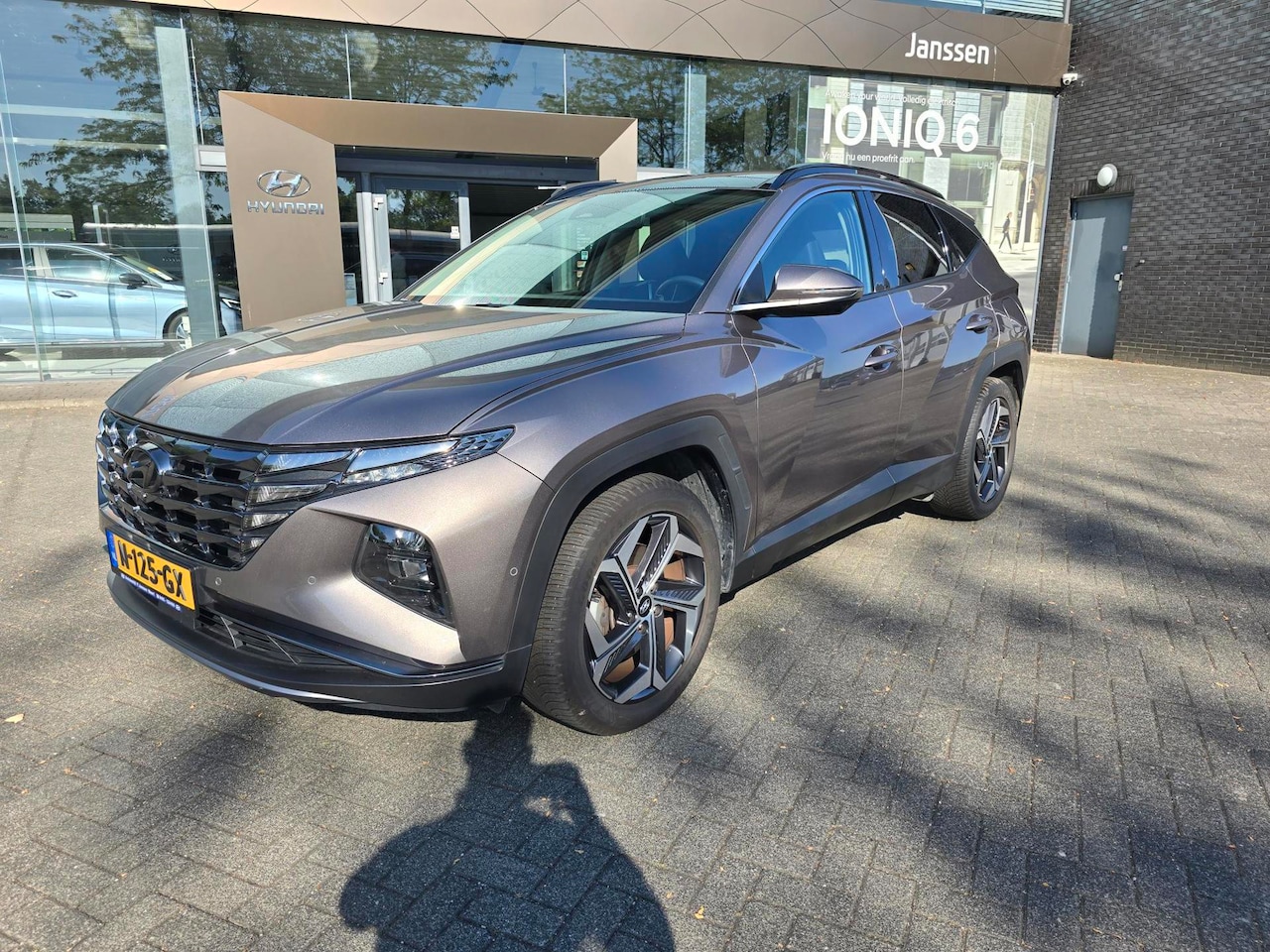 Hyundai Tucson - 1.6 T-GDI HEV Premium Sky trekhaak/1e eig/NL-auto - AutoWereld.nl