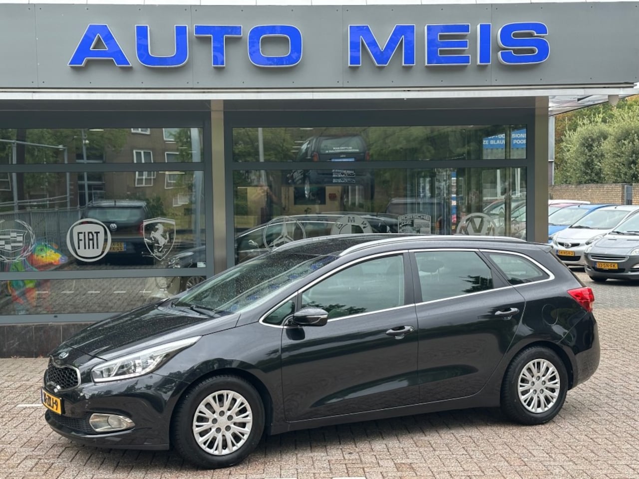 Kia Cee'd - 1.6 GDI Plus pack Navi Airco Cruise Camera Trekhaak - AutoWereld.nl