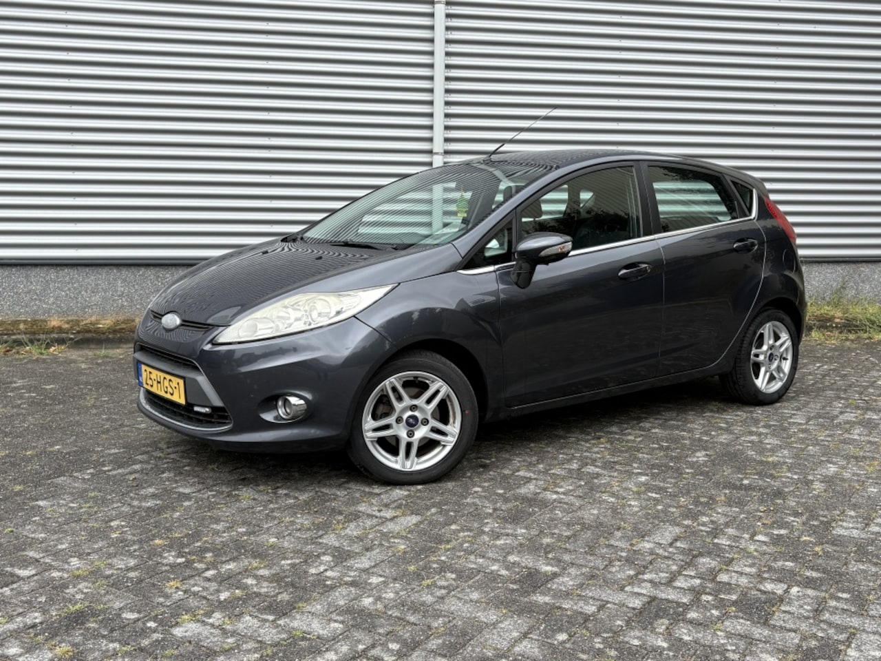 Ford Fiesta - 1.25 Titanium Airco 5 Deurs Velgen Parrot APK - AutoWereld.nl