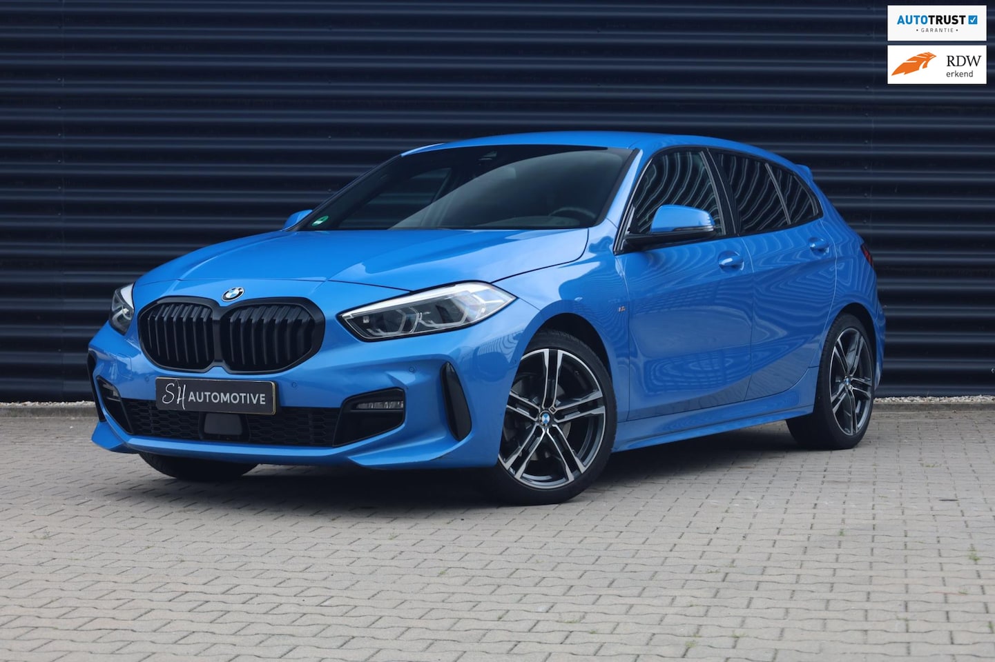 BMW 1-serie - 118i Business M Sport / Carplay / Stoelverwarming / Camera - AutoWereld.nl