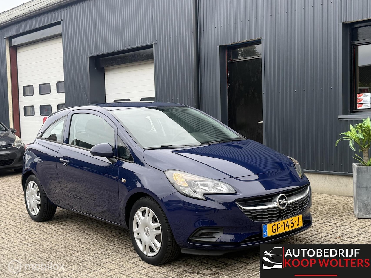 Opel Corsa - 1.4 Black Edition AIRCO-31000KM NAP- - AutoWereld.nl