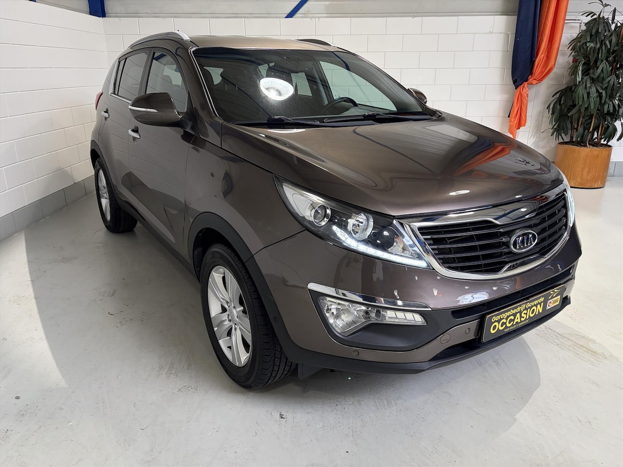 Kia Sportage - 1.6 GDI Plus Pack 1.6 GDI 135pk Plus Pack, Navi, Camera, Parksensoren - AutoWereld.nl