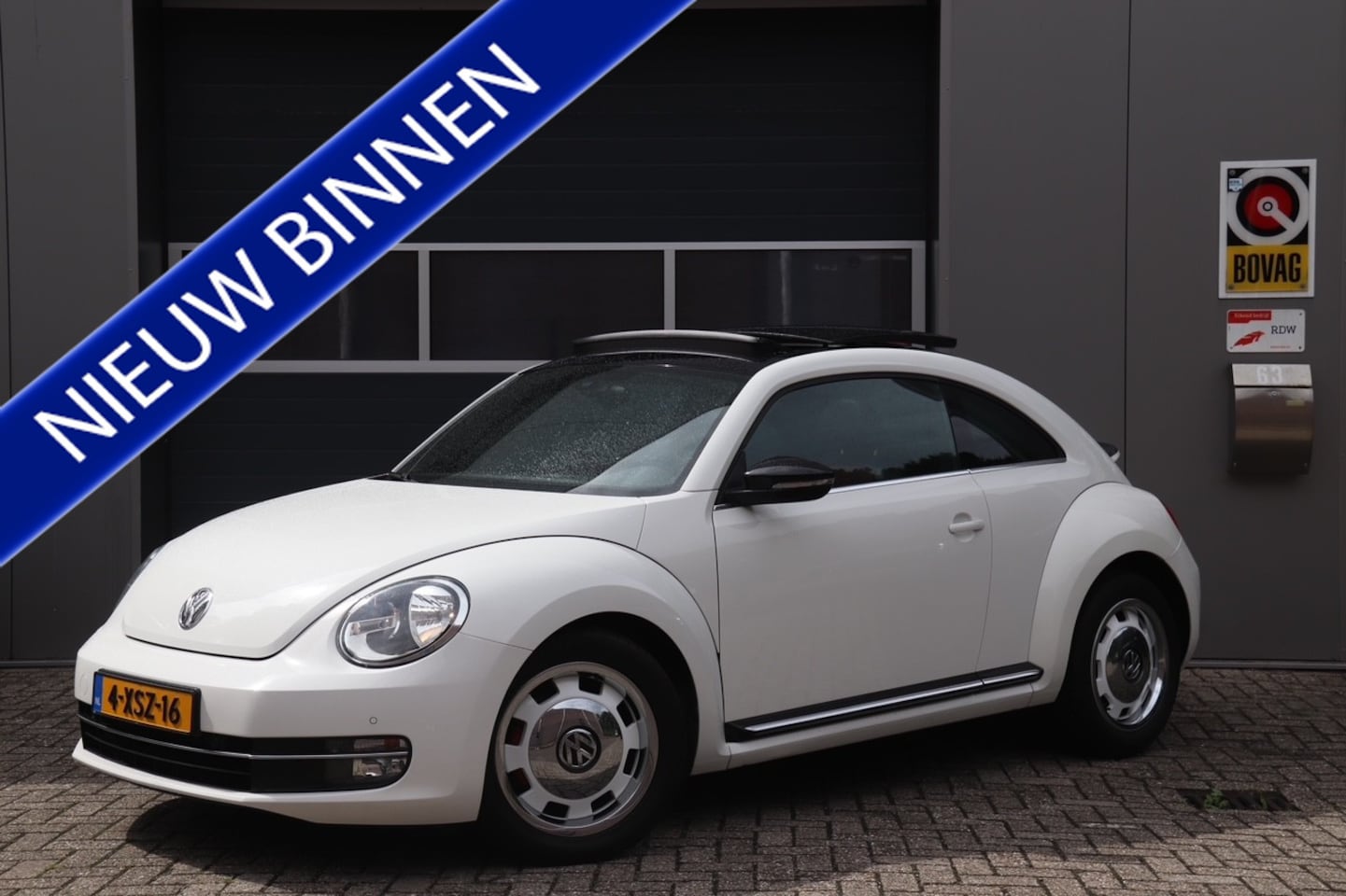 Volkswagen Beetle - 2.0 TSI Sport Automaat 200pk, Stoelverwarming, Pano, Leer - AutoWereld.nl