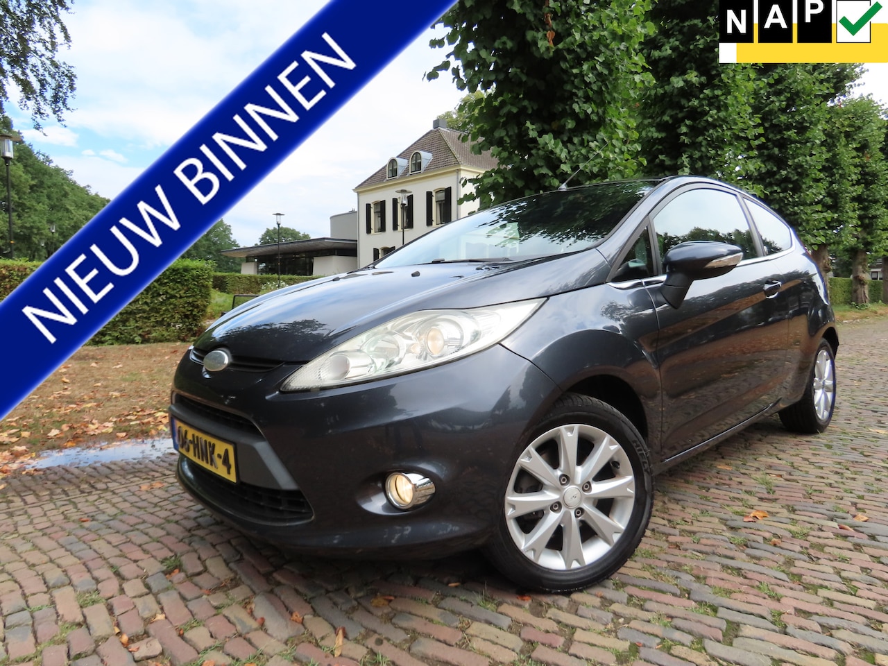 Ford Fiesta - 1.25 Ghia Airco Lm Velgen Trekhaak - AutoWereld.nl