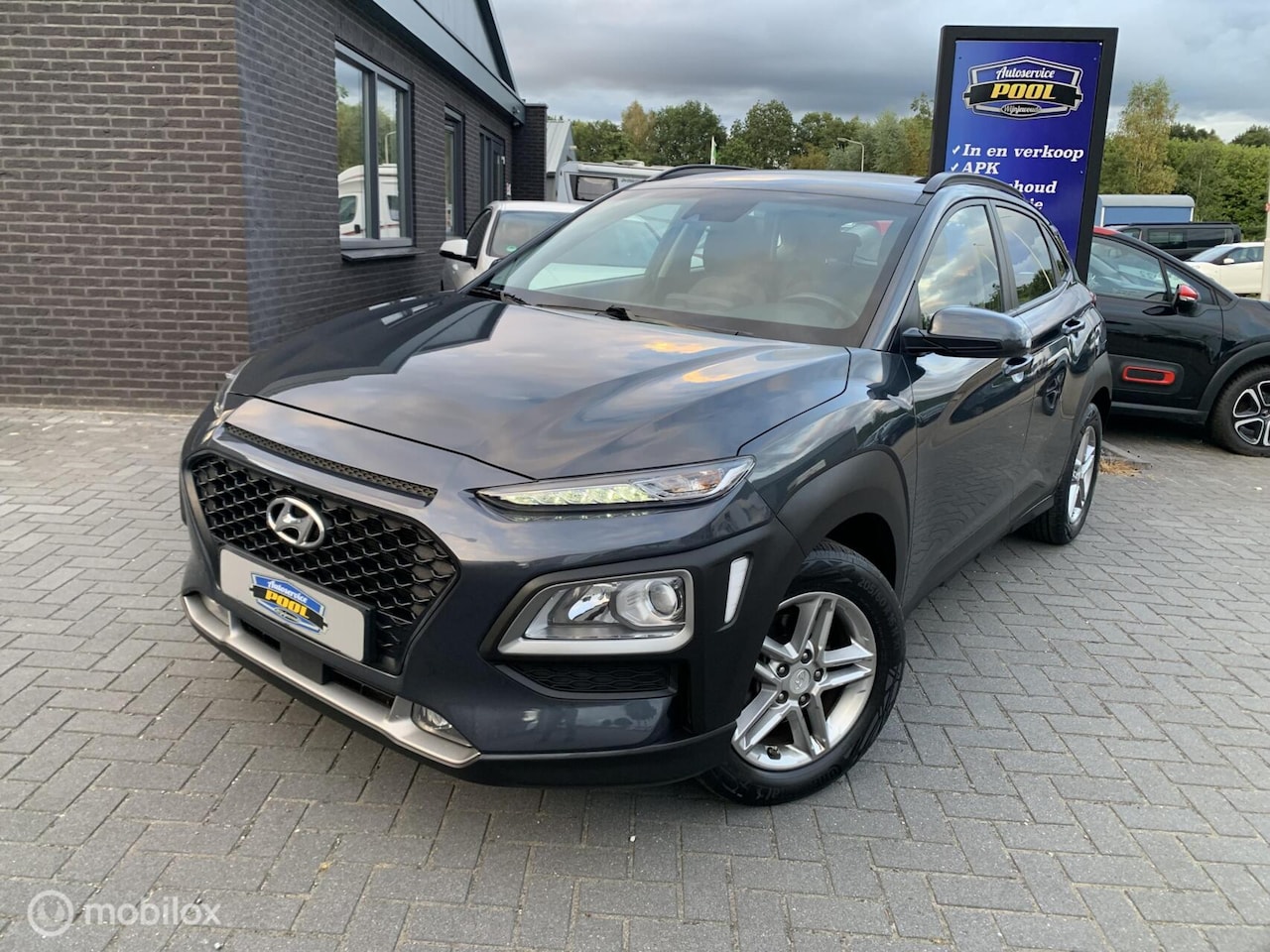 Hyundai Kona - 1.0 T-GDI Comfort|Navi|Clima|Trekhaak|Camera - AutoWereld.nl