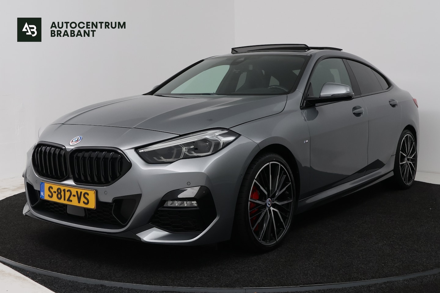 BMW 2-serie Gran Coupé - 218i High Executive (PANORAMADAK, CAMERA, STOELVERWARMING, NAVIGATIE) - AutoWereld.nl