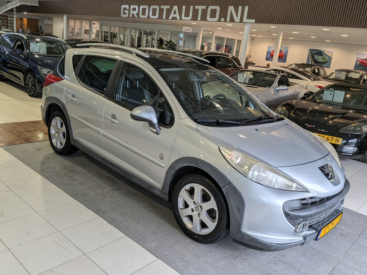 Peugeot 207 SW Outdoor - 1.6 VTi XS Panoramadak, Airco, Stuurbekrachtiging - AutoWereld.nl