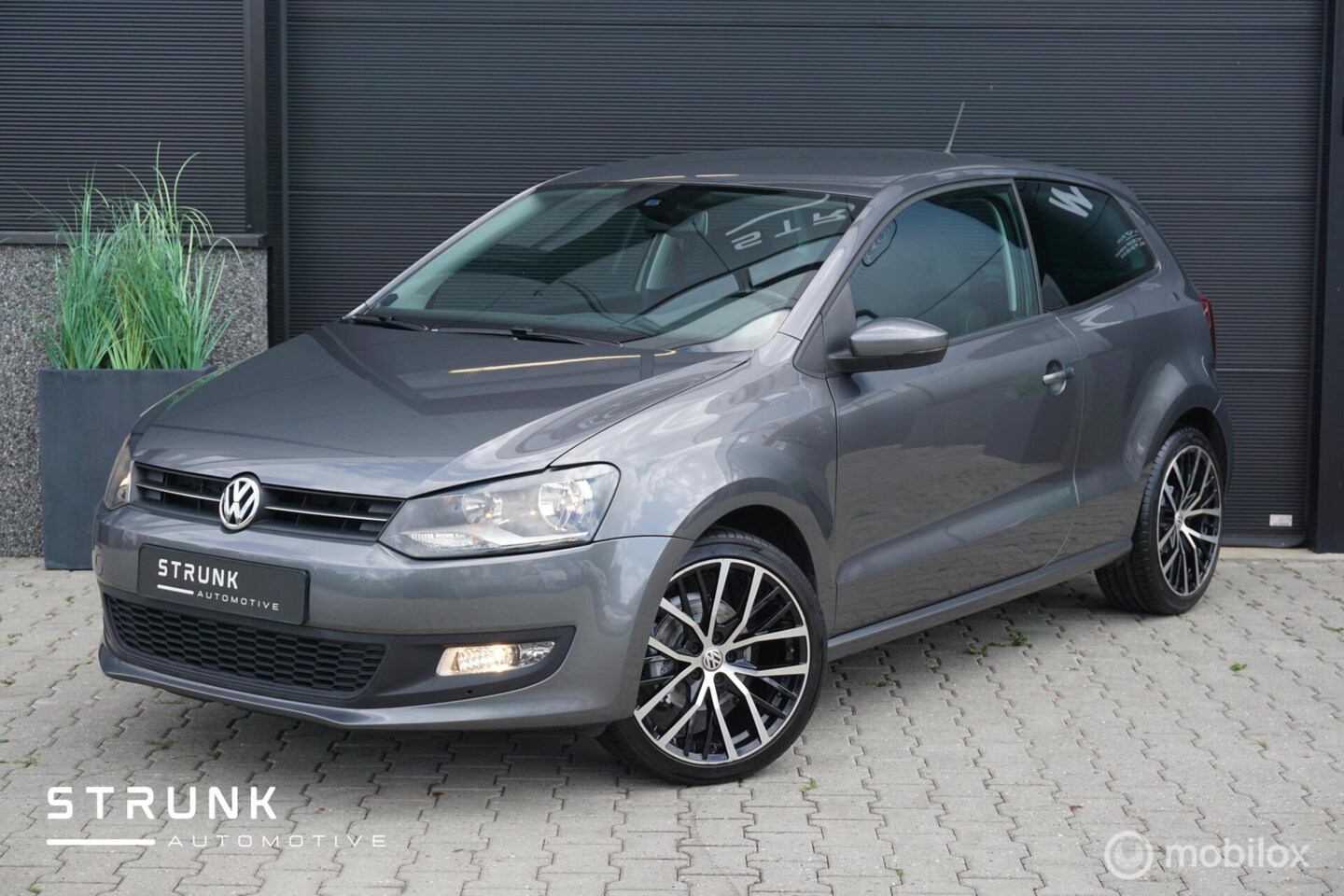 Volkswagen Polo - 1.4-16V Highline Airco Bluetooth Cruise Stoelverwarm - AutoWereld.nl
