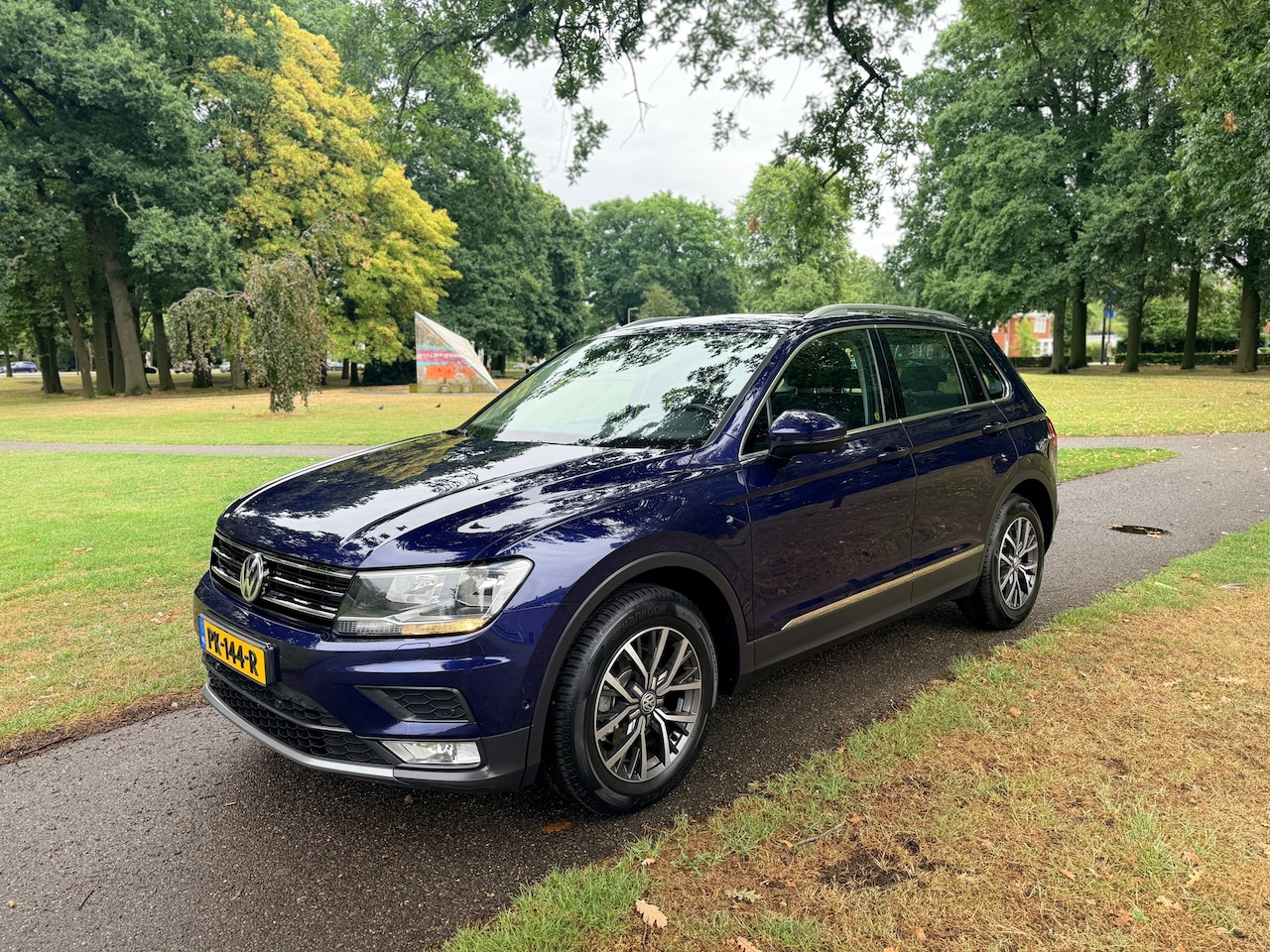 Volkswagen Tiguan - 1.4 TSI ACT Highline top onderhouden lees tekst - AutoWereld.nl