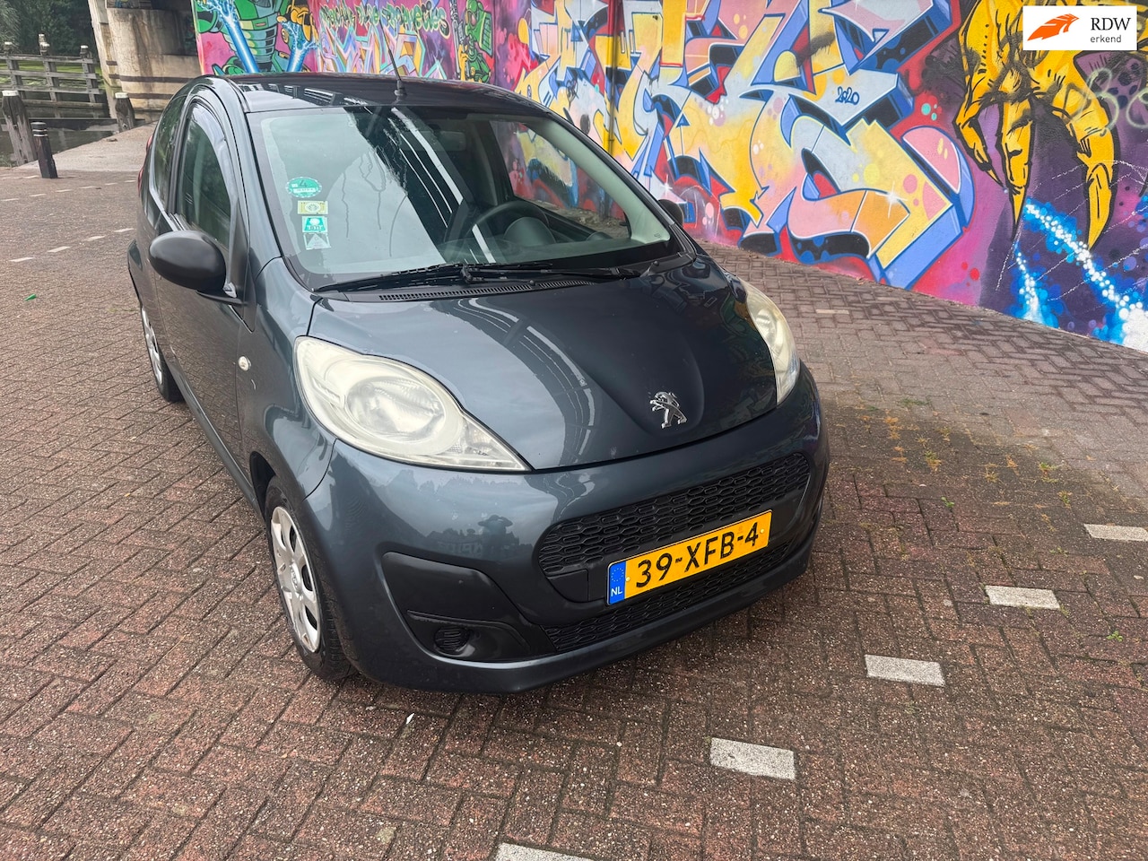 Peugeot 107 - 1.0 Access Accent werkende airco. stereo stuurbekrachtiging goed onderhouden auto boeken a - AutoWereld.nl