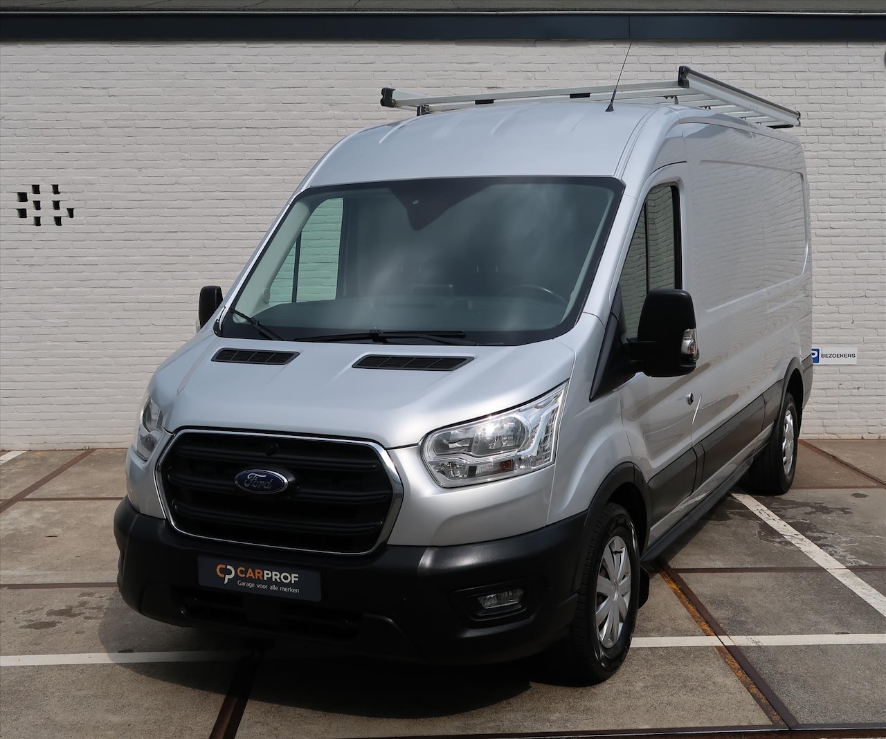Ford Transit - GB 310 L3H2 TDCi 130pk FWD Trend I Airco I PDC V+A I Navigatie I Trekhaak I Imperiaal I Cr - AutoWereld.nl