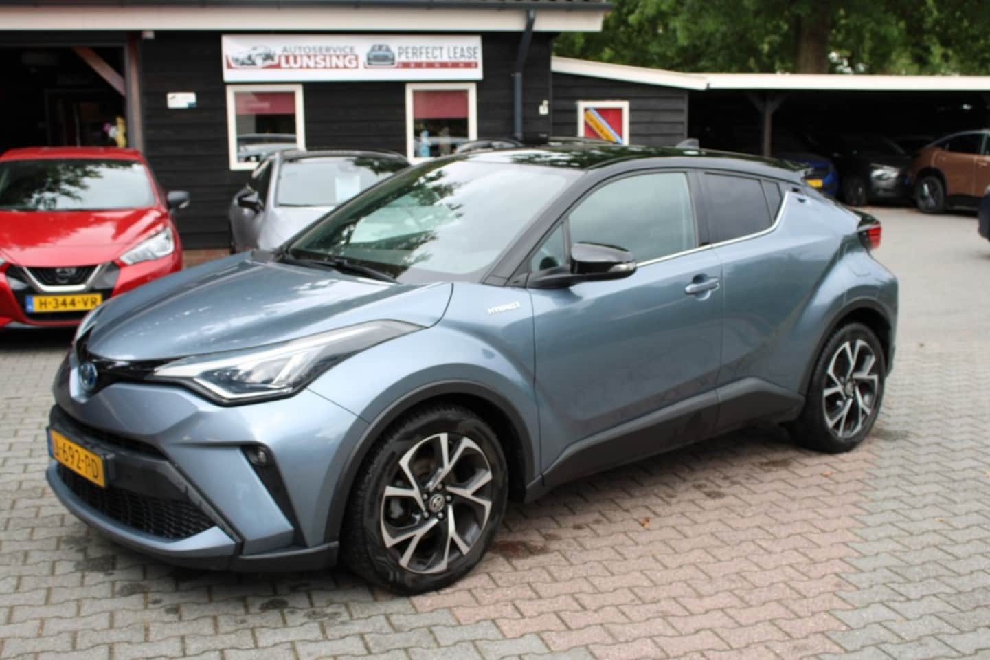 Toyota C-HR - 1.8 Hybrid First edition - JBL Trekhaak Navi - AutoWereld.nl