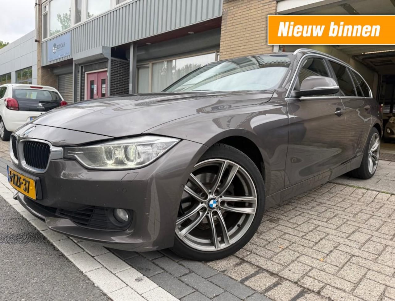 BMW 3-serie - 320i High Executive HUD SPORT STOELEN LEER NETTE AUTO NAP APK 8-2027 - AutoWereld.nl