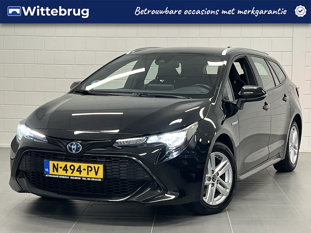 Toyota Corolla Touring Sports - 1.8 Hybrid Active APPLE / ANDROID NAVIGATIE | PARKEERCAMERA | LICHTMETALEN VELGEN - AutoWereld.nl