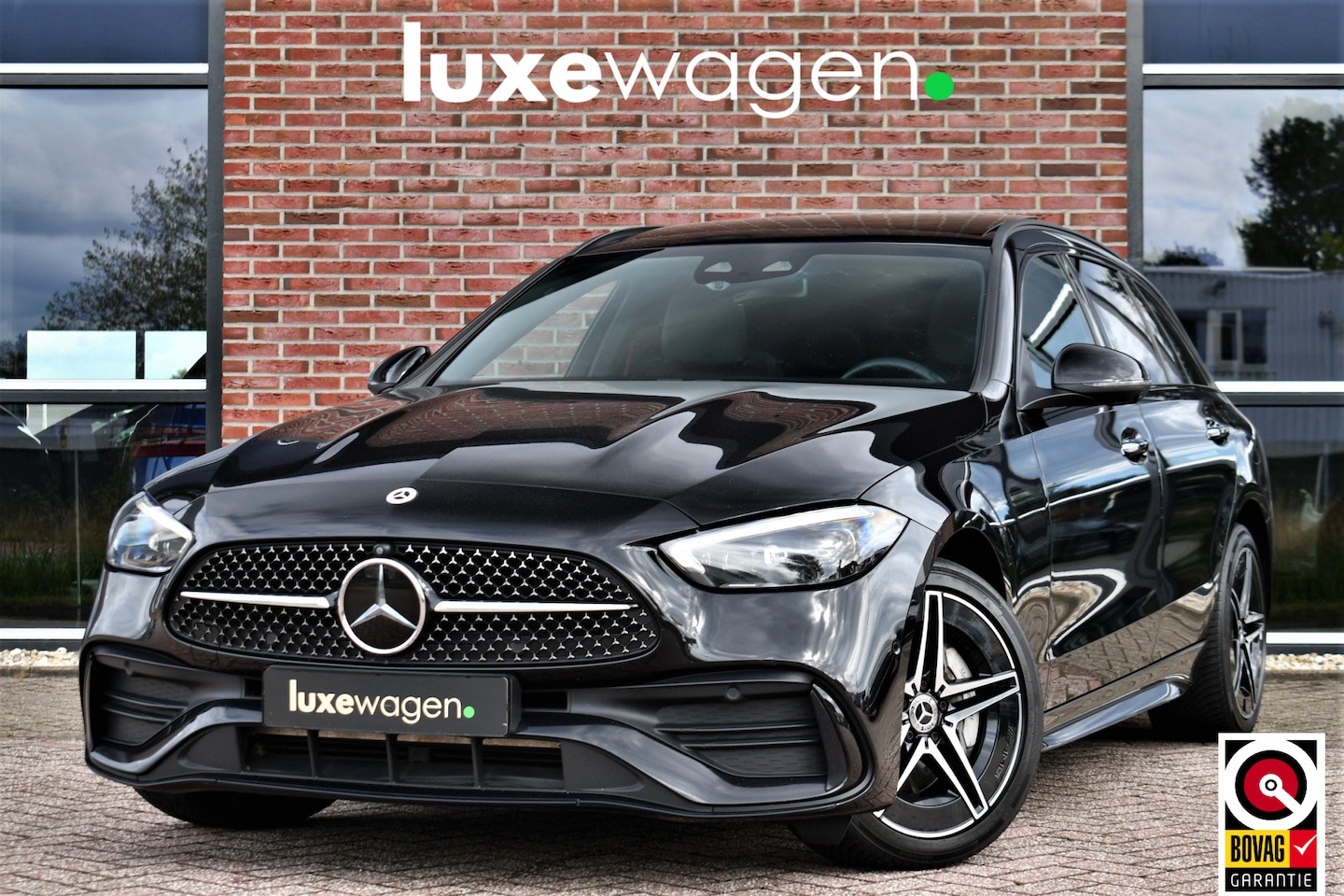 Mercedes-Benz C-klasse Estate - 300 e AMG Line Pano Distr HUD 360 Burm Massage+Ventilatie - AutoWereld.nl